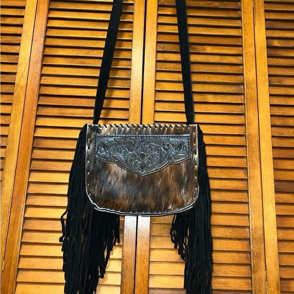 Lowenherz Handbags - Lowenherz Leather Western  Cowhide Purse like new never used